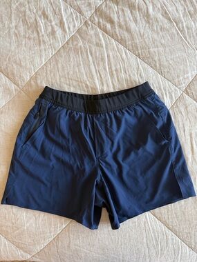 Qty: 7 - Ten Thousand Lined Navy Interval Shorts with Black Waistband